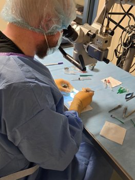 Kyle Nance distribution and processing supervisor at Rocky Mountain Lions Eye Bank doing cornea prep